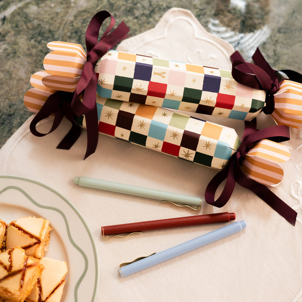 Add a festive pop to your holiday assortment with Papier’s Cracker Stocking Stuffer. Designed for gifting, this eye-catching cracker includes three vibrant fineliners—ideal for customers shopping for stationery lovers, creatives, or journalers.