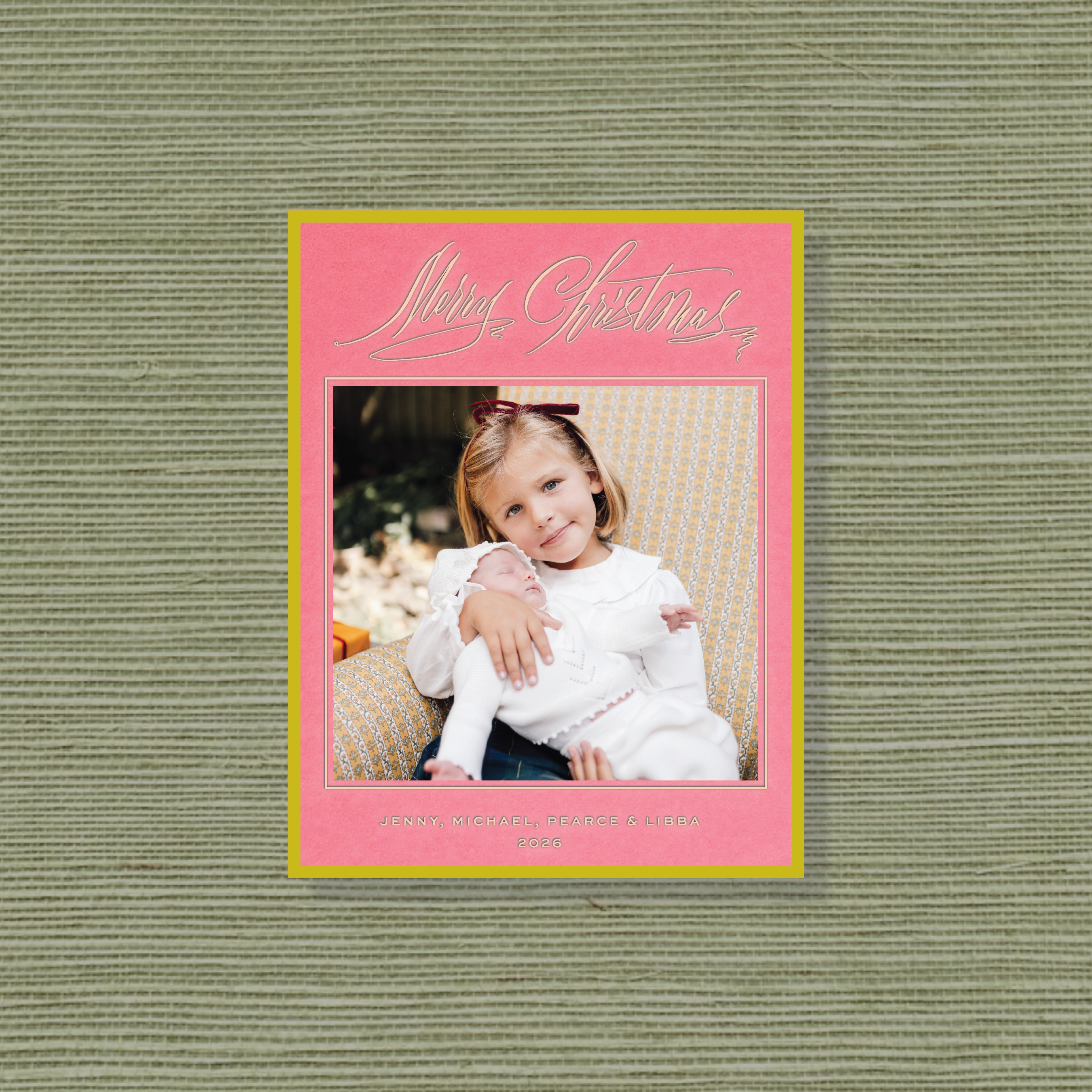 Aldridge Engraved Photo Card, featuring family holiday photos framed in burgundy and teal with elegant engraved “Merry Christmas” calligraphy and personalized family names.