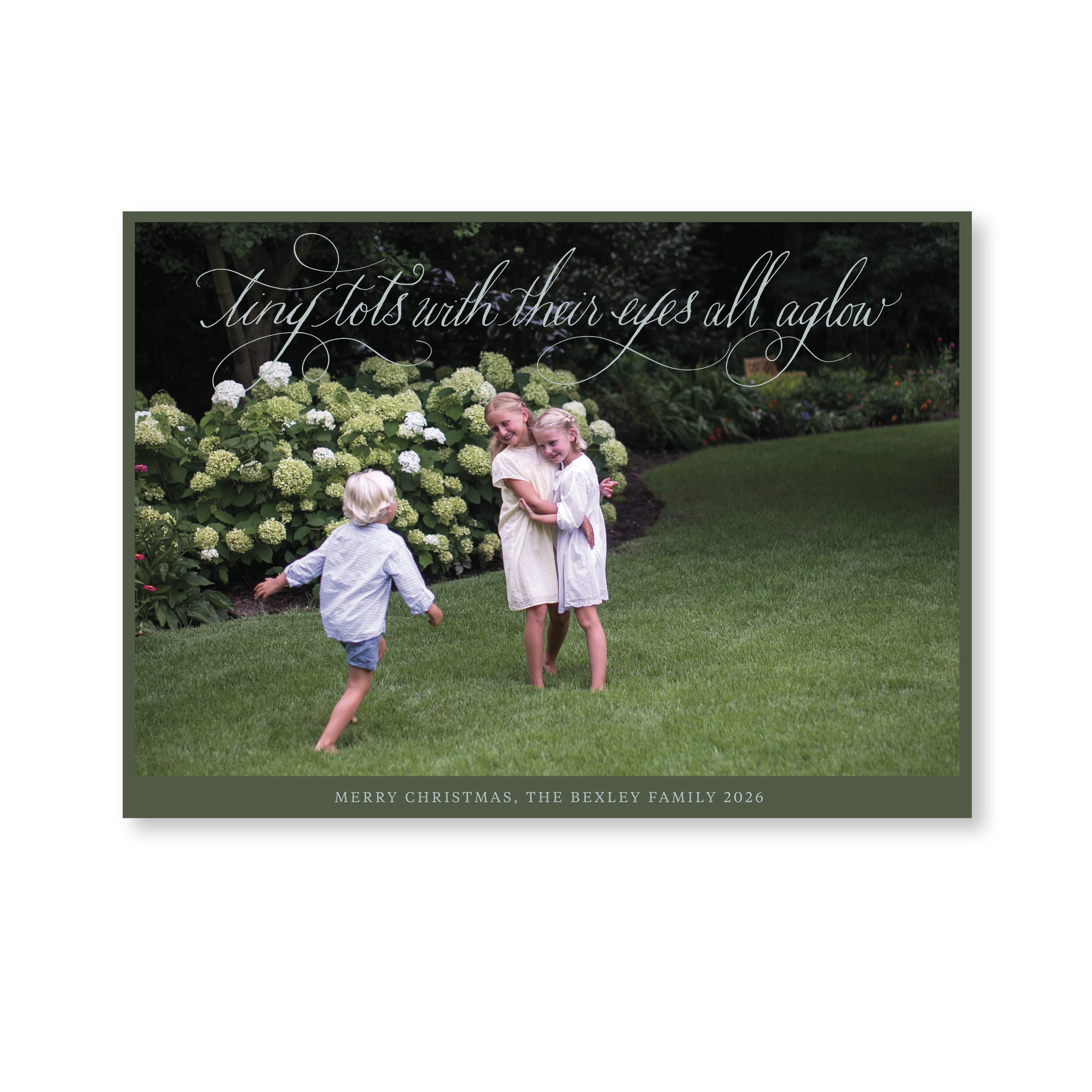 Celebrate the season with the Bexley "Tiny Tots with Their Eyes All Aglow" Holiday Card by Stovall Collection. Featuring original hand-lettered artwork, this luxury personalized photo mount holiday card is available in 22 thoughtfully curated flat printing colorways.