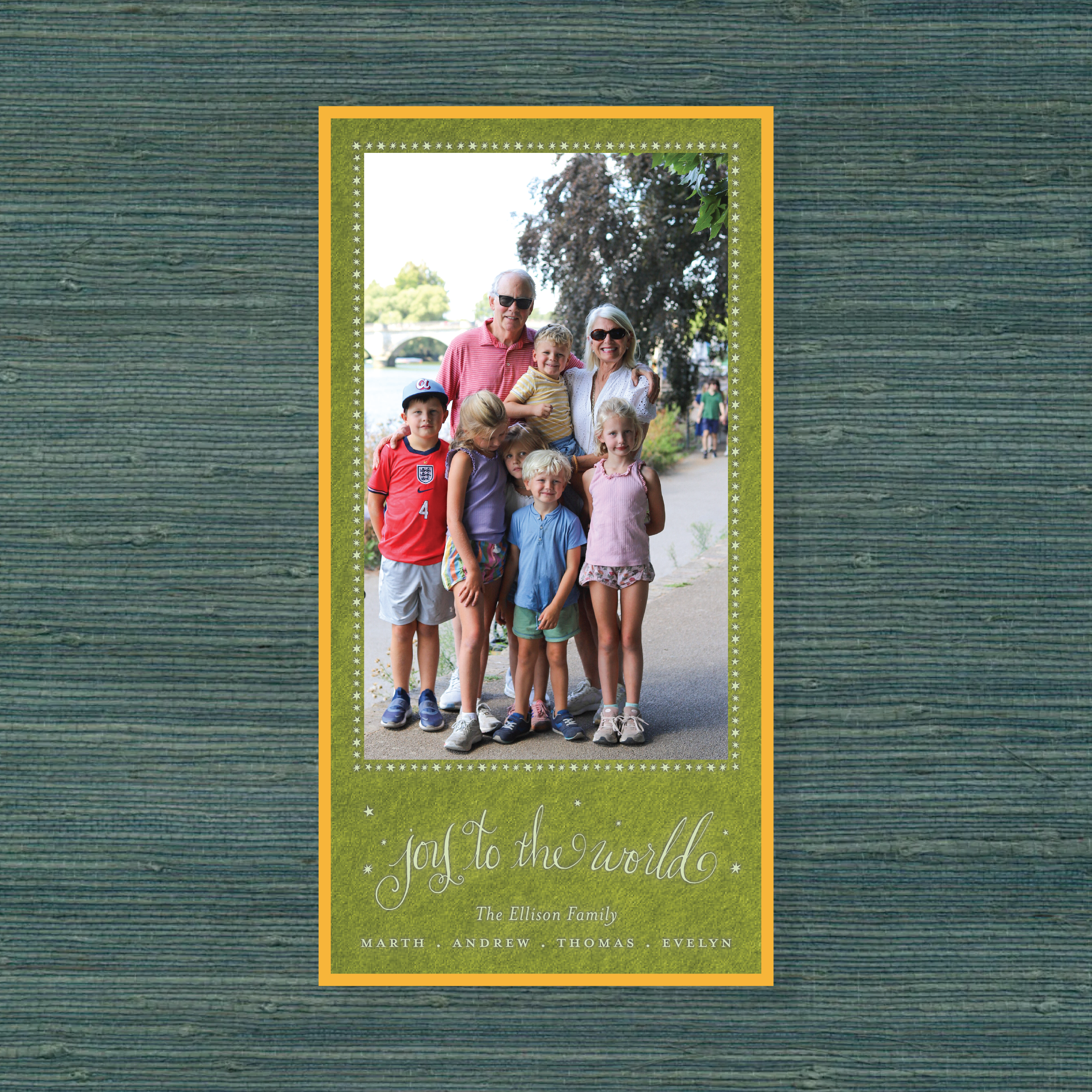Ellison Engraved Holiday Card featuring hand-drawn “Joy to the World” lettering, delicate star accents, and a favorite family photograph.