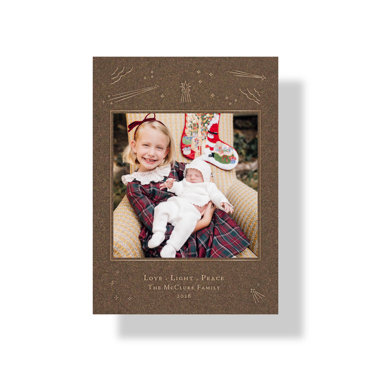 Hera engraved photo holiday card in bronze shimmer paper with metallic champagne ink and celestial star details