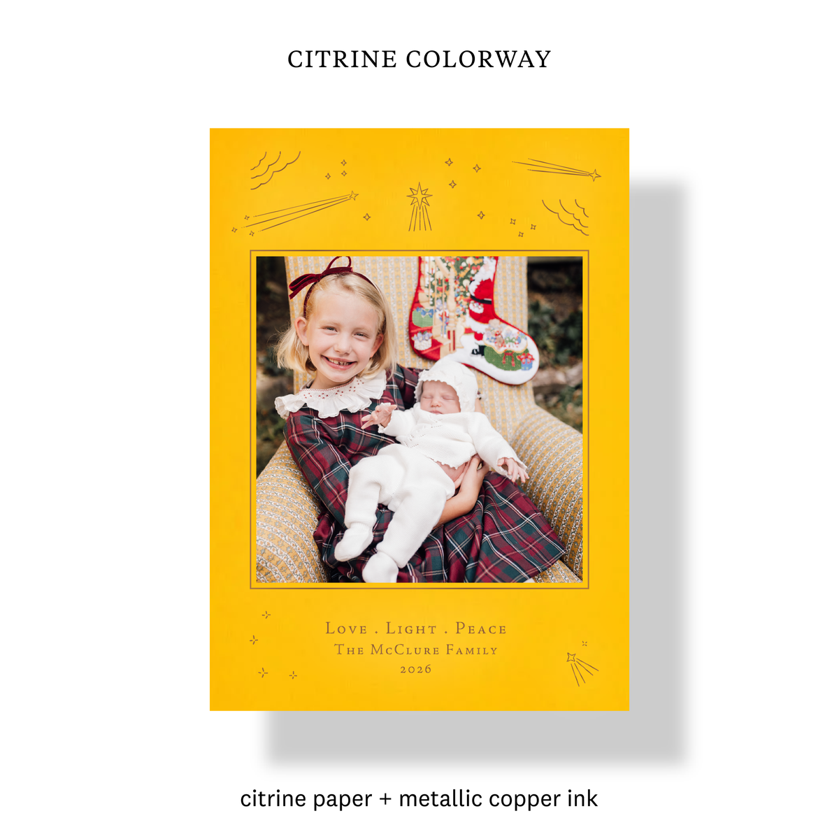 Citrine colorway of the Hera Engraved Holiday Card with mounted family photo and metallic copper celestial details