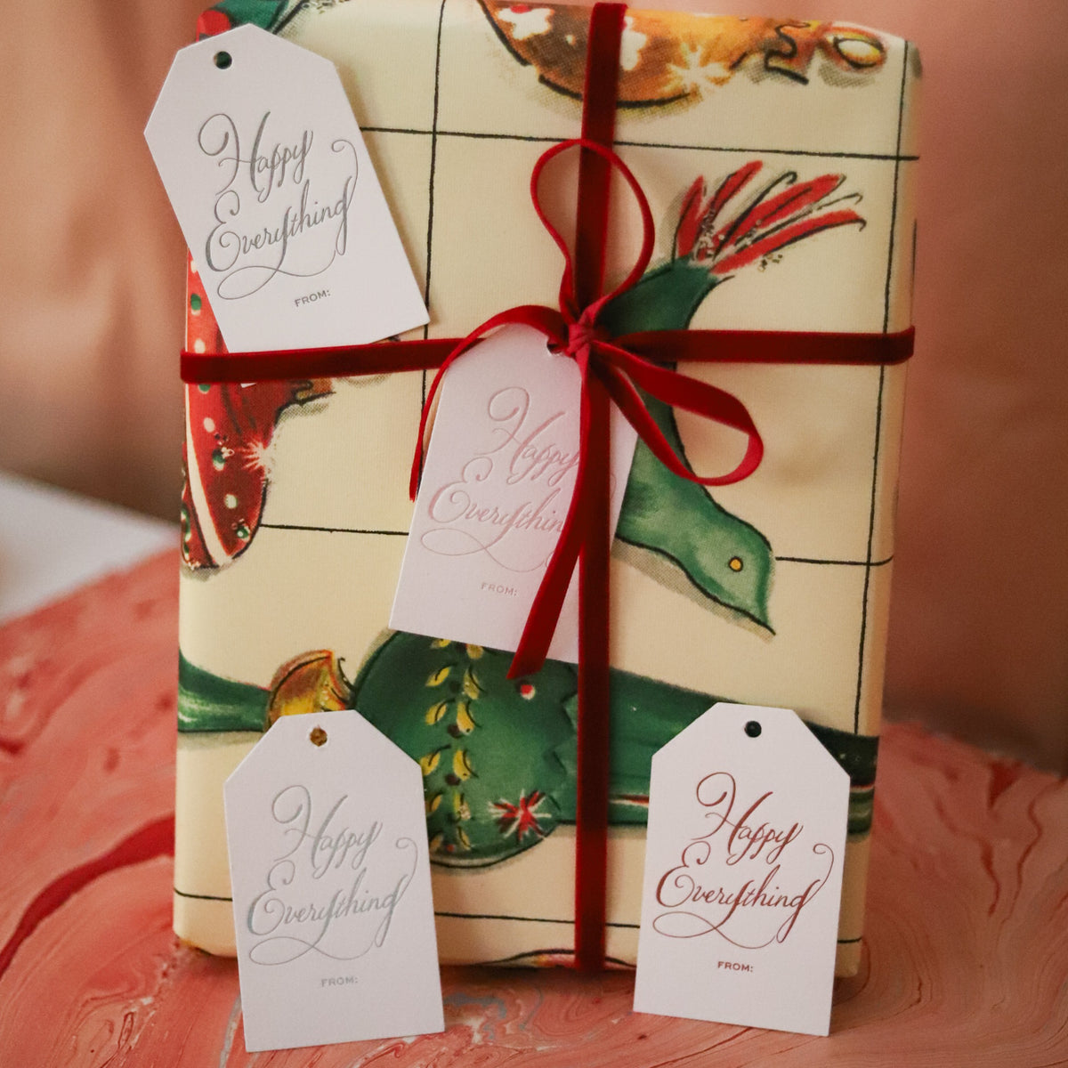 Shop Happy Everything Gift Tags in sets of 8, featuring elegant hand-lettered lettering, To and From lines, and coordinating colors for festive holiday wrapping.