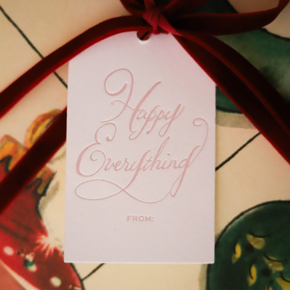 Shop Happy Everything Gift Tags in sets of 8, featuring elegant hand-lettered lettering, To and From lines, and coordinating colors for festive holiday wrapping.