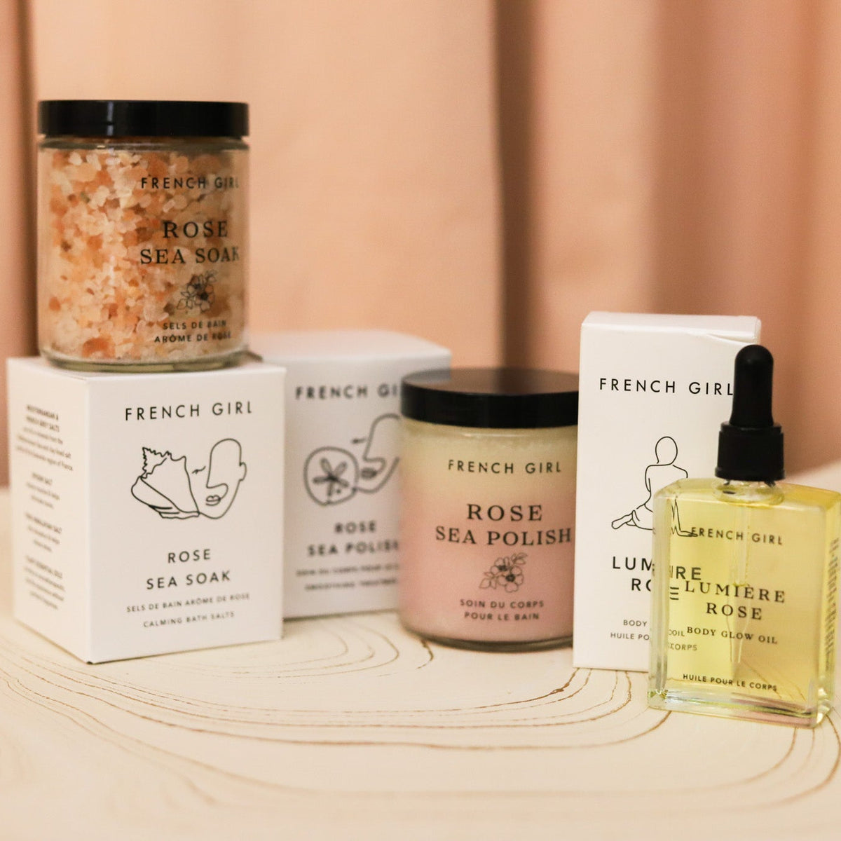 French Girl Rose Body Polish gently exfoliates with sea salt and organic sugar while nourishing oils leave skin soft, smooth and beautifully scented.