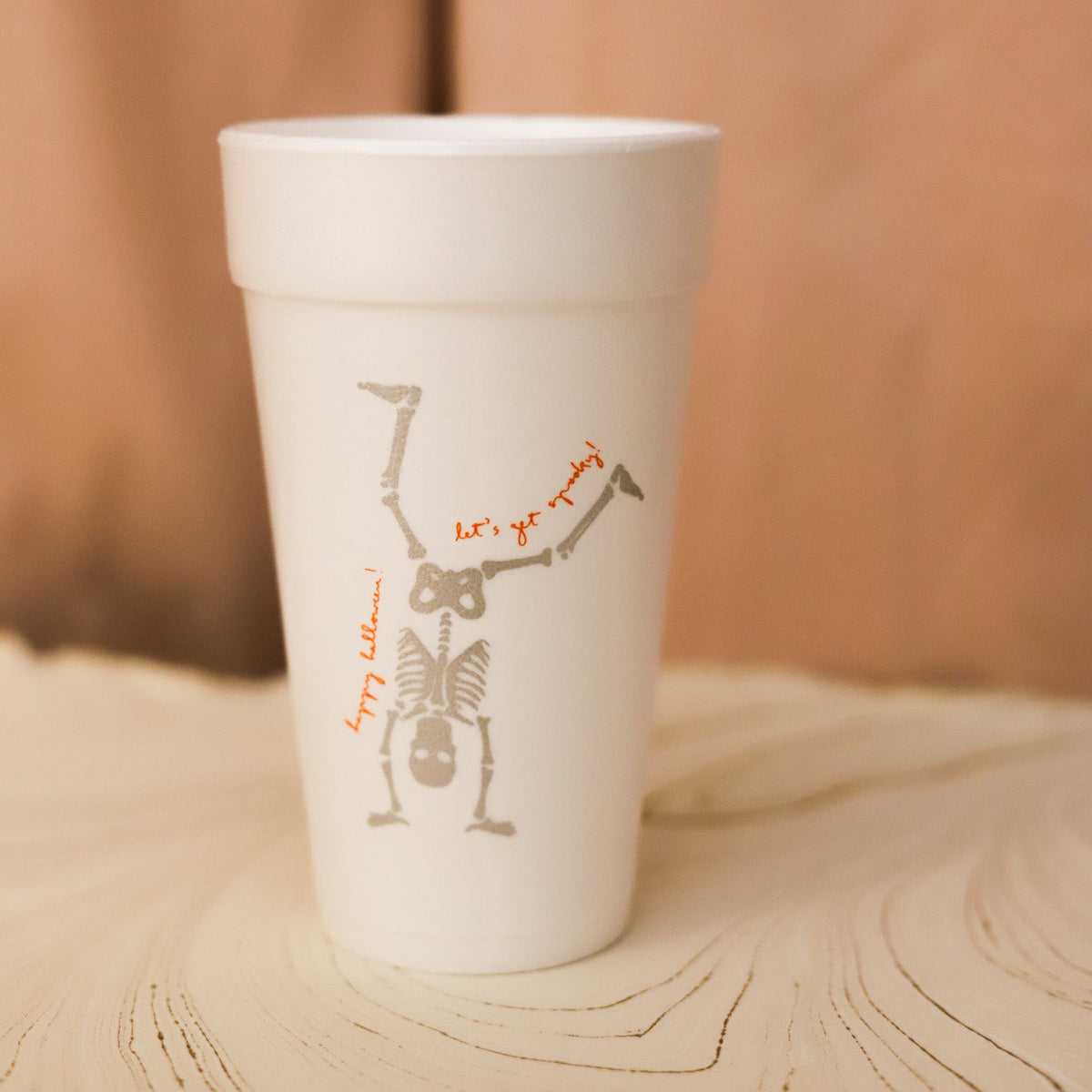white foam cup with halloween graphics