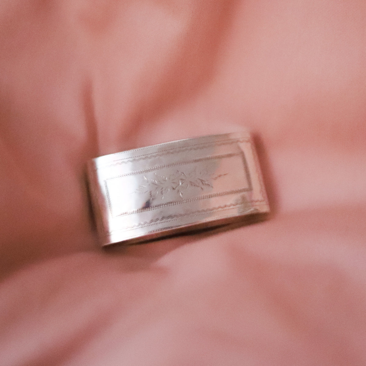 A tiny treasure with more than two centuries of history, this antique sterling silver box was made in Birmingham, England and hallmarked in 1818, during the reign of King George III