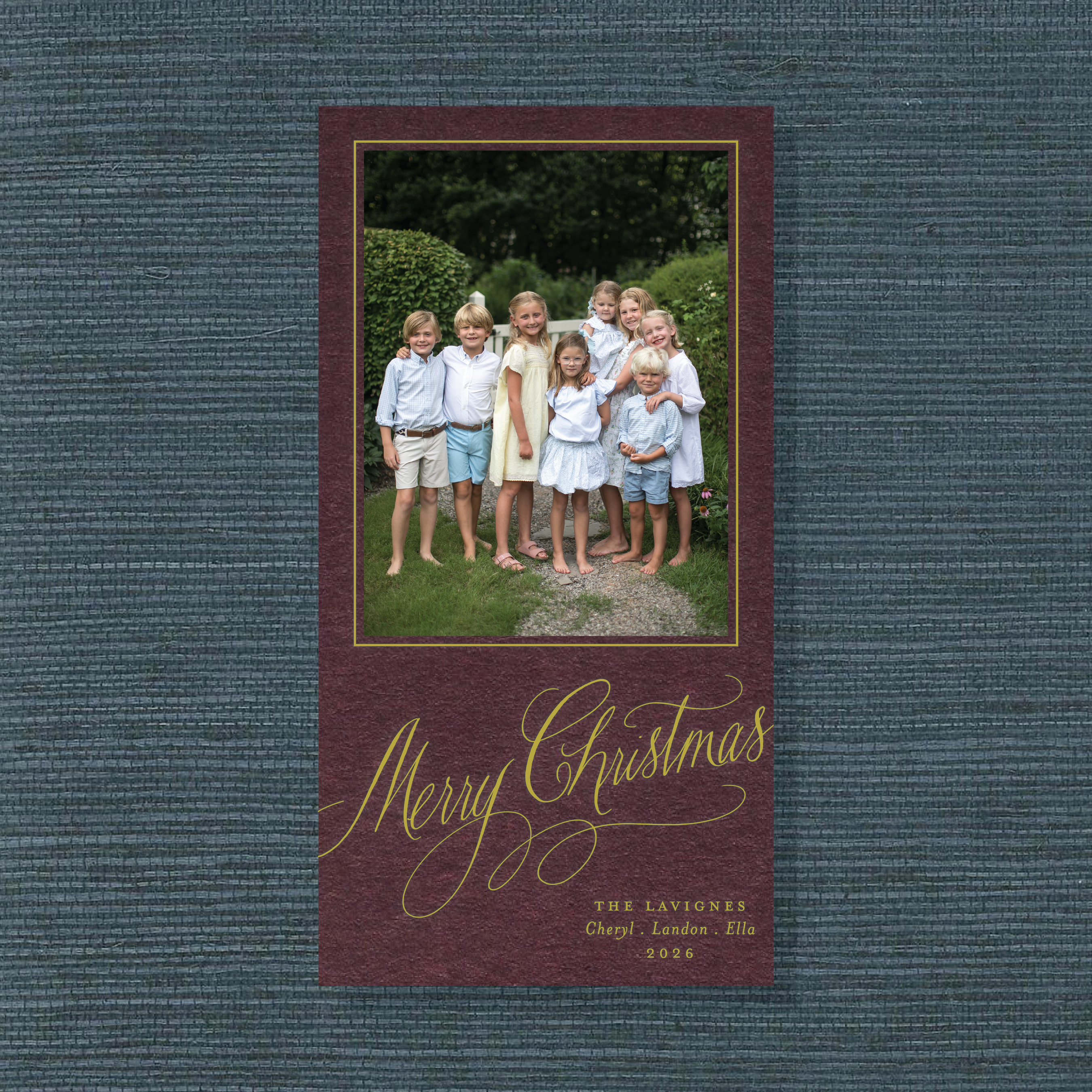 Lavigne Engraved Holiday Card featuring oversized hand-lettered “Merry Christmas” calligraphy, a family photograph, and traditional engraving.