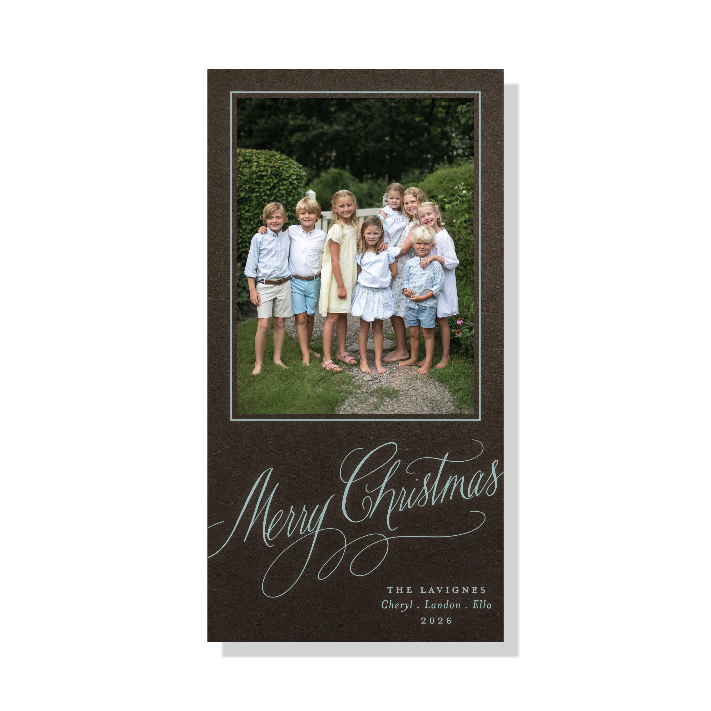 Lavigne Engraved Holiday Card featuring oversized hand-lettered “Merry Christmas” calligraphy, a family photograph, and traditional engraving.