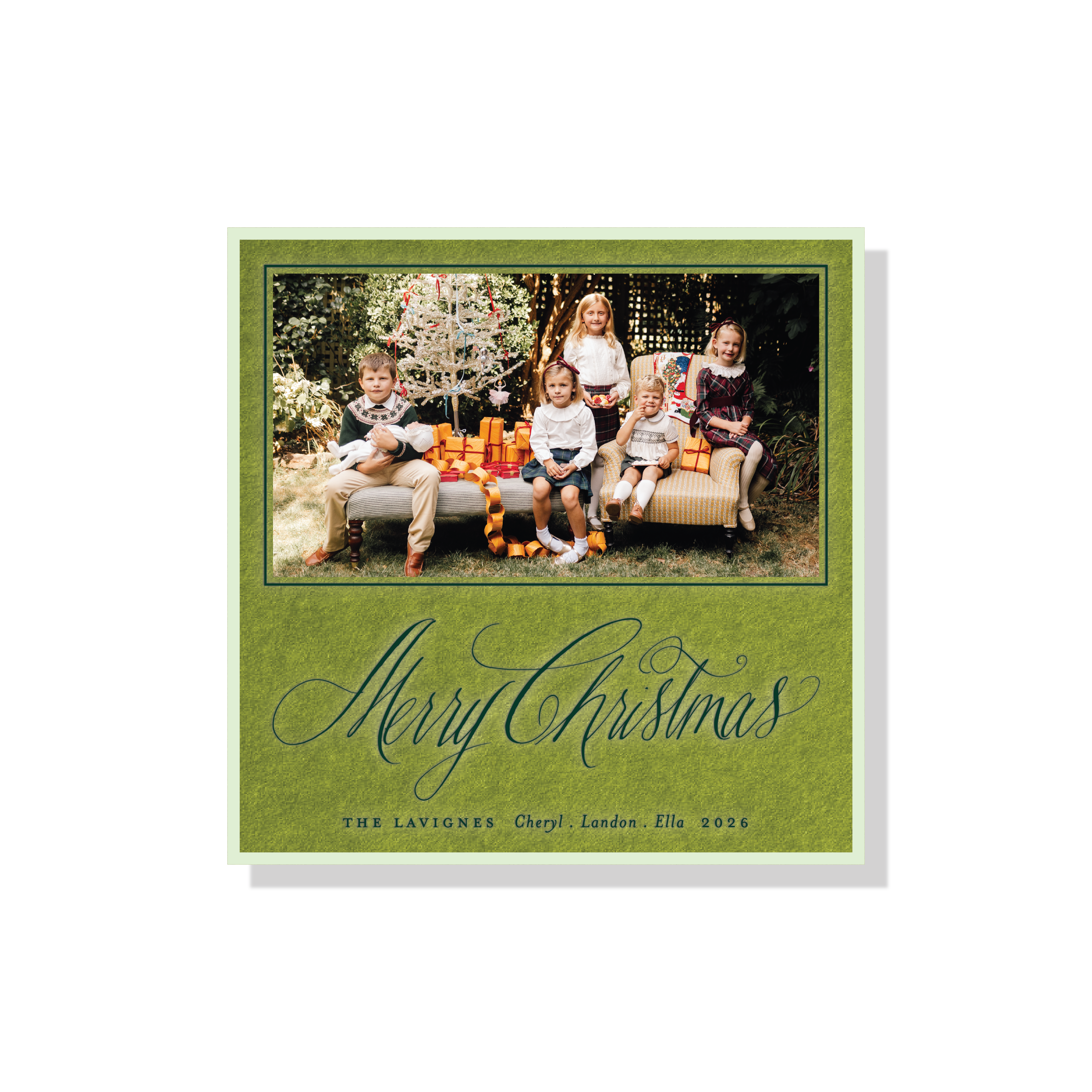 Personalized Lavigne Engraved Holiday Card featuring a family photograph and elegant pen-and-ink “Merry Christmas” artwork.