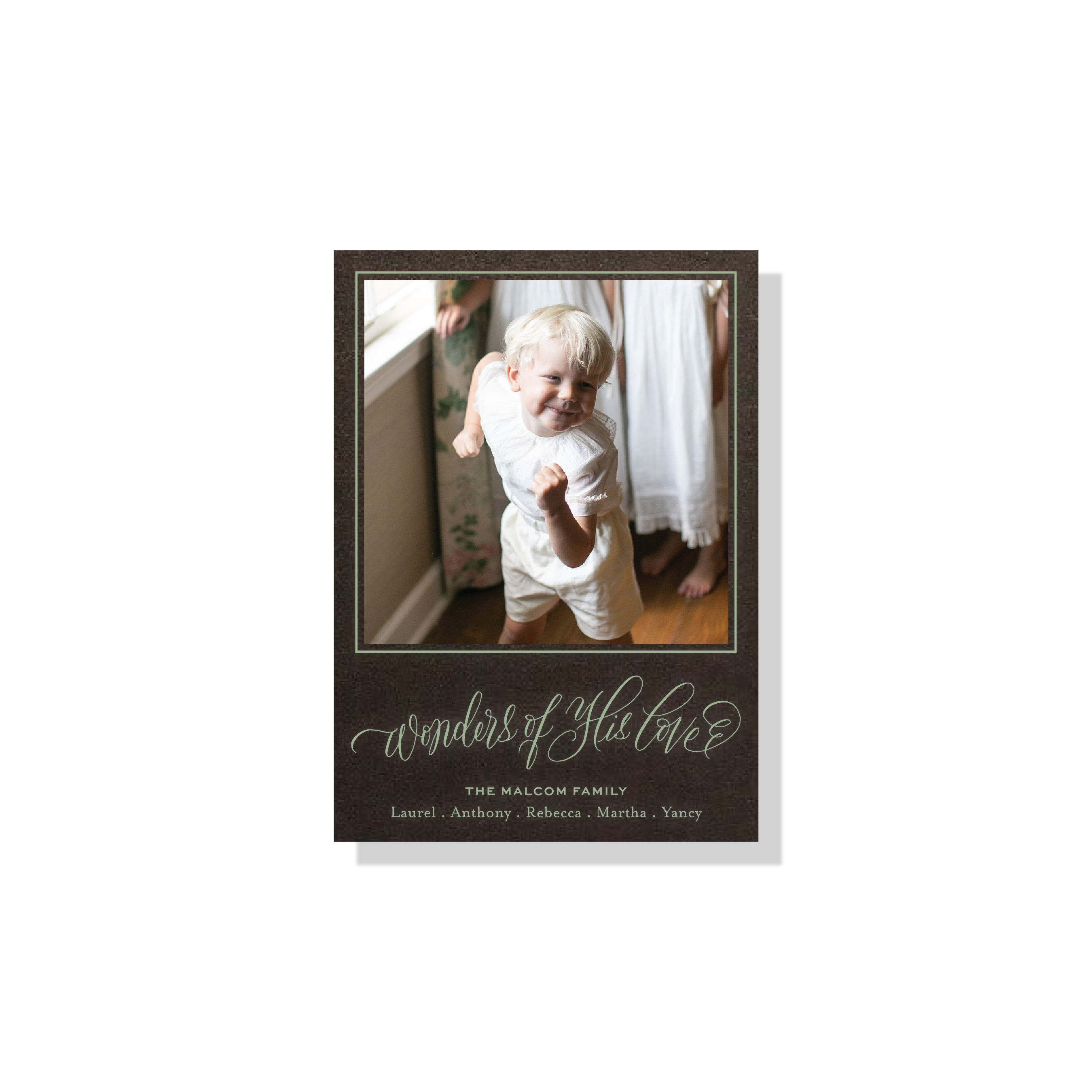 Personalized Loxley Engraved Holiday Card featuring a family photograph and graceful hand-lettered “Wonders of His Love” artwork.