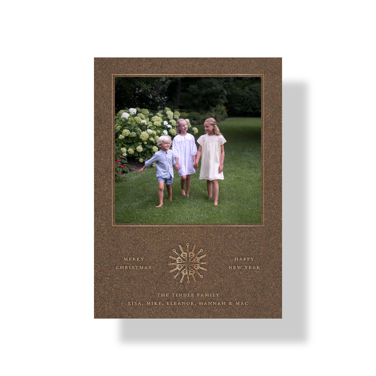 Rhea engraved photo holiday card in bronze shimmer paper with metallic champagne ink and celestial medallion