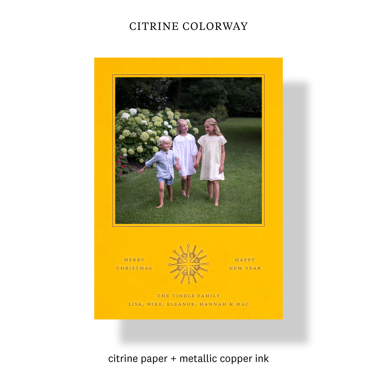 Citrine colorway of the Rhea Engraved Holiday Card with mounted family photo and metallic copper starburst detail