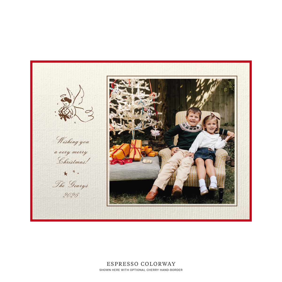 The Sutton personalized photo Christmas card by Stovall Collection, featuring a vintage Christmas angel, classic script typography and a family photograph on creamy laid paper.