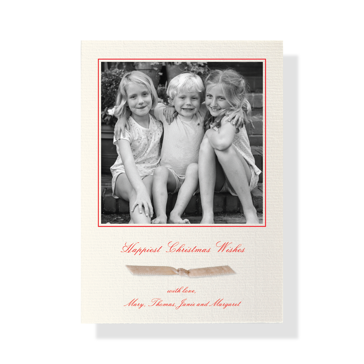 Sutton Velvet Ribbon Classic Print Holiday Card with black and white family photo, red ink and blush velvet ribbon