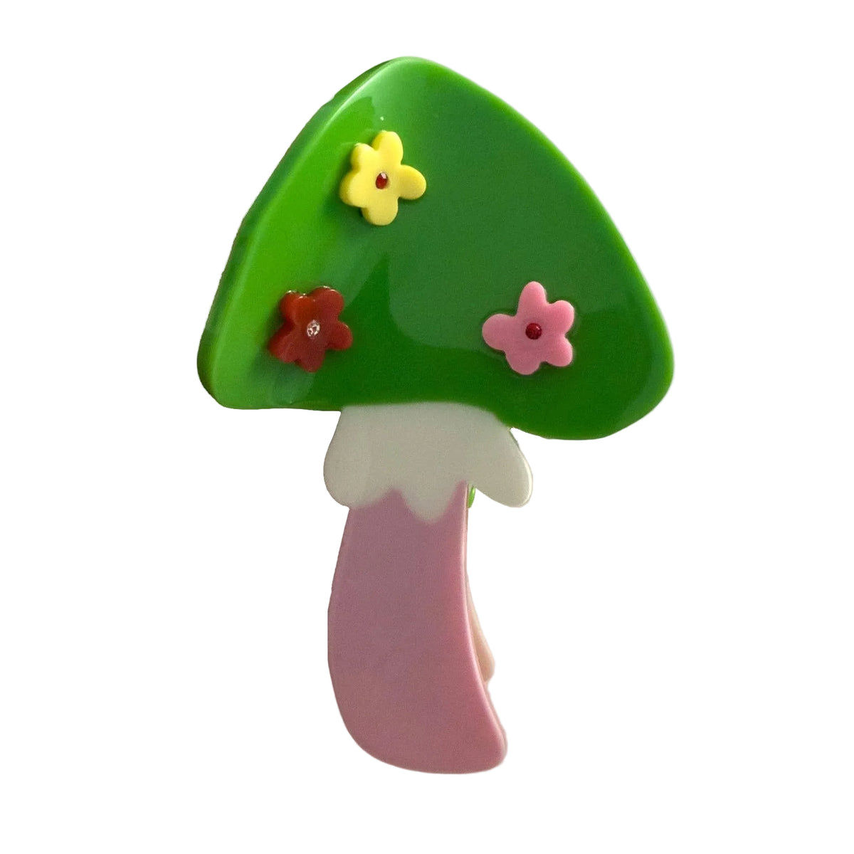The Flower Mushroom Hair Claw features a glossy green cap, colorful floral details and a pink stem, handmade from playful cellulose acetate.
