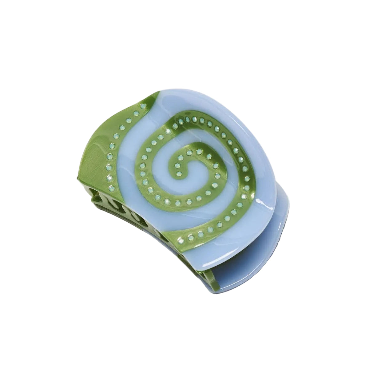 The Laguna Spiral Hair Claw features soft blue and green cellulose acetate with sparkling rhinestone details in a sculptural swirl design.
