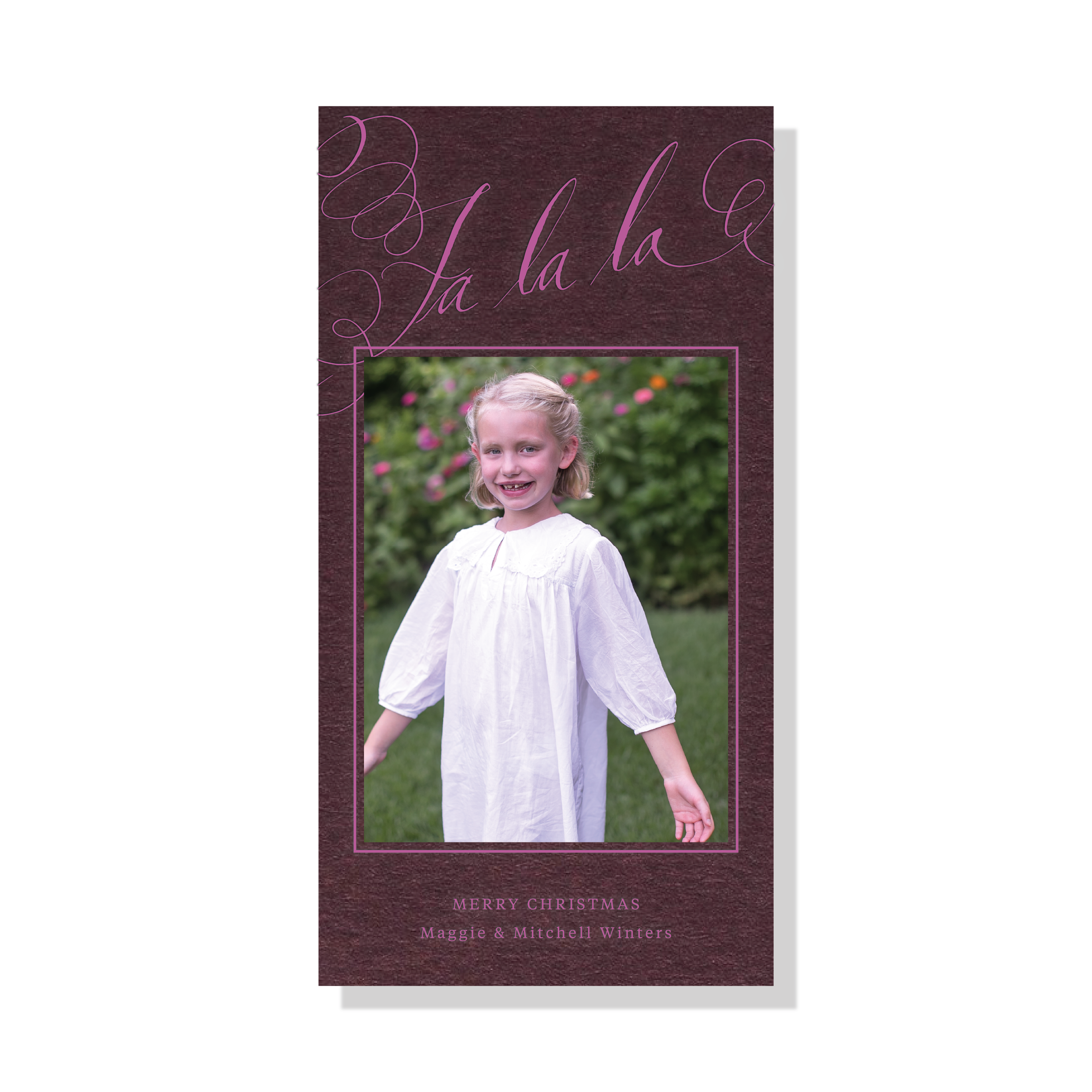 Farnley Engraved Christmas Photo Card with a family photograph, expressive pen-and-ink “Fa La La” calligraphy, and raised engraving.