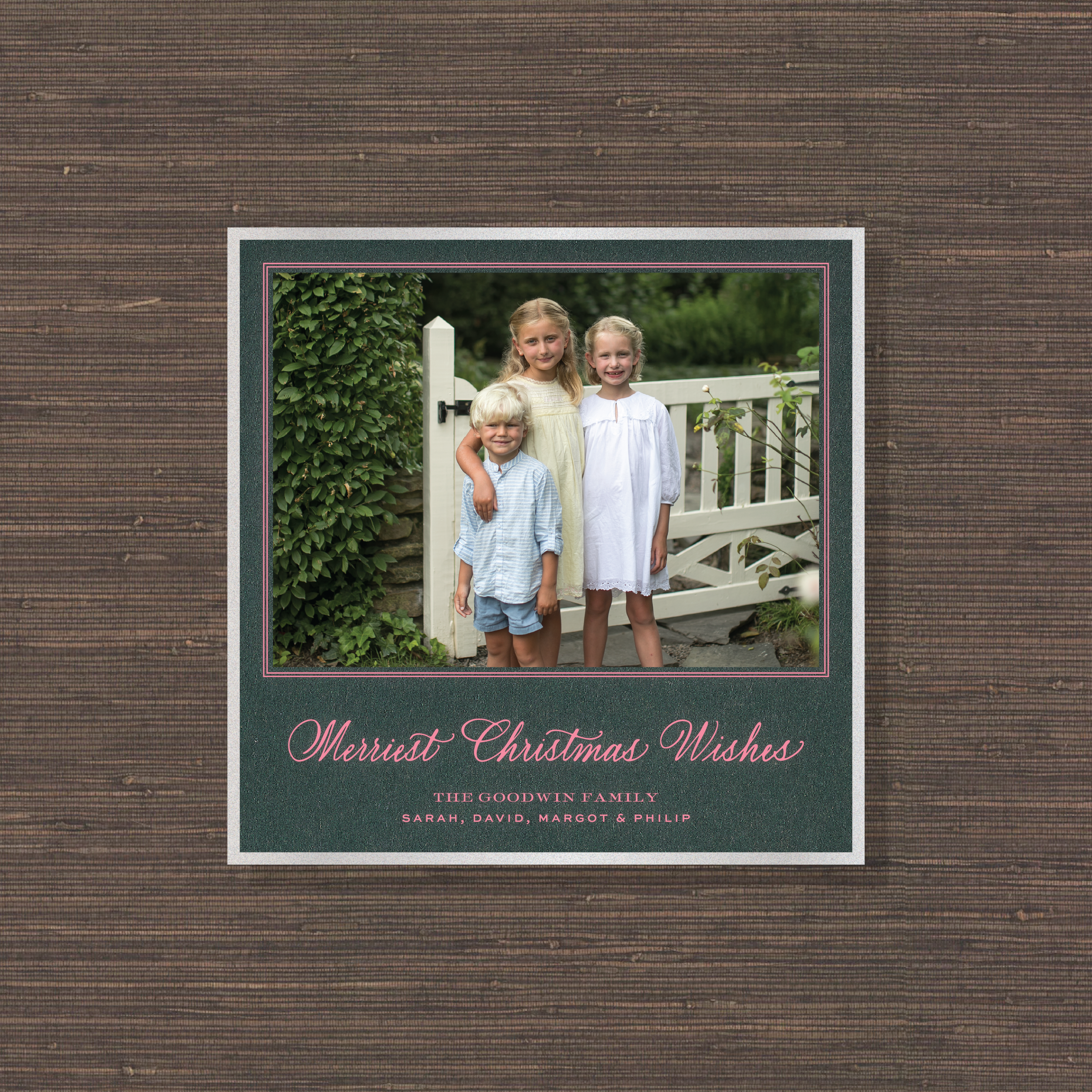 Luxury Goodwin Engraved Holiday Card featuring a family photograph and elegant “Merriest Christmas Wishes” hand-lettering.