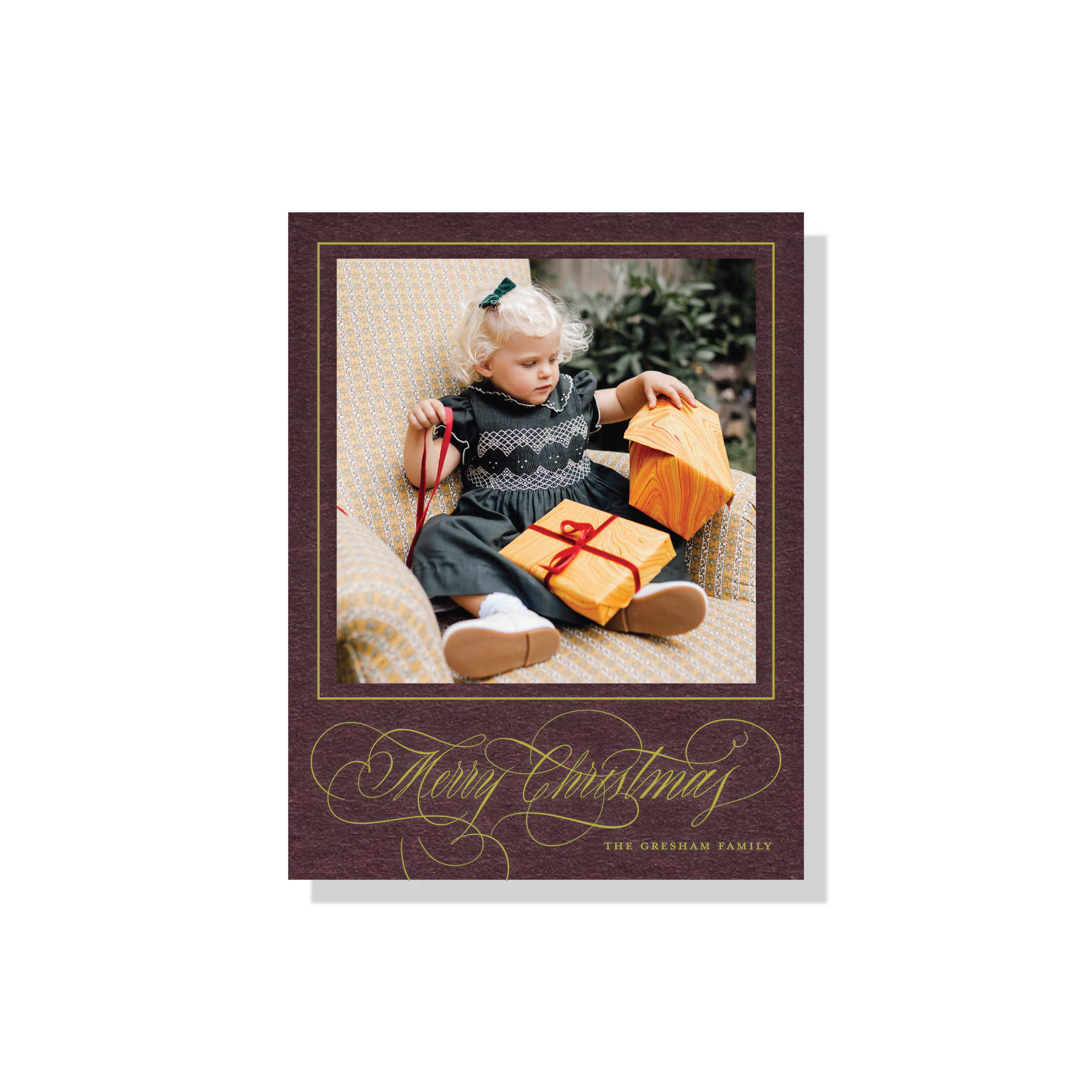 Gresham Engraved Christmas Photo Card with a child’s portrait, elegant hand-lettered “Merry Christmas” flourishes, and traditional engraving.