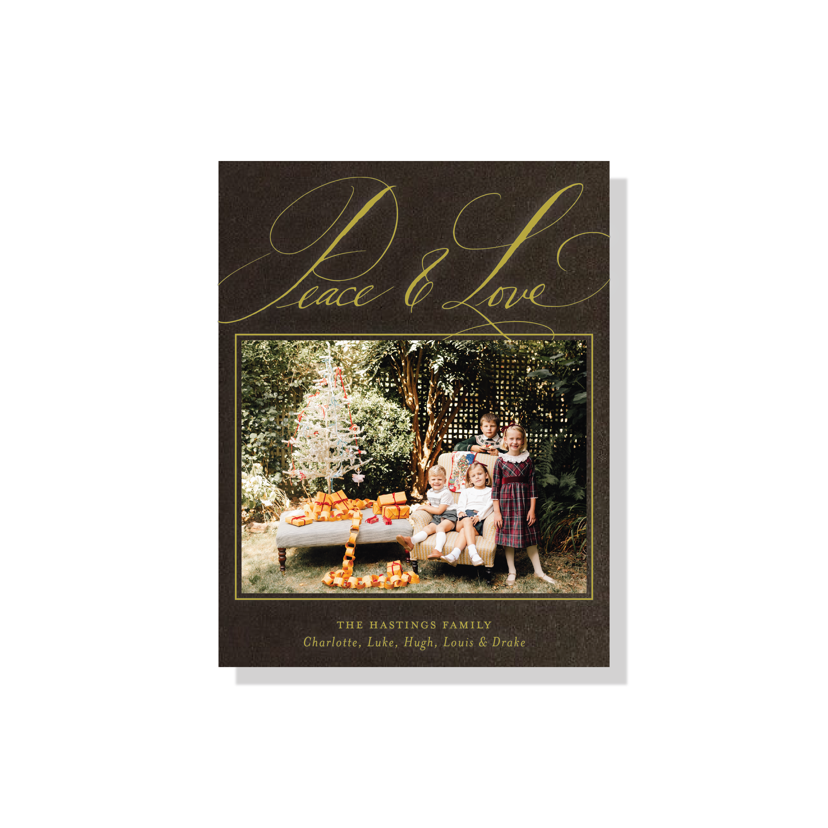 Personalized Hastings Engraved Holiday Card featuring a family photograph and graceful pen-and-ink “Peace & Love” lettering