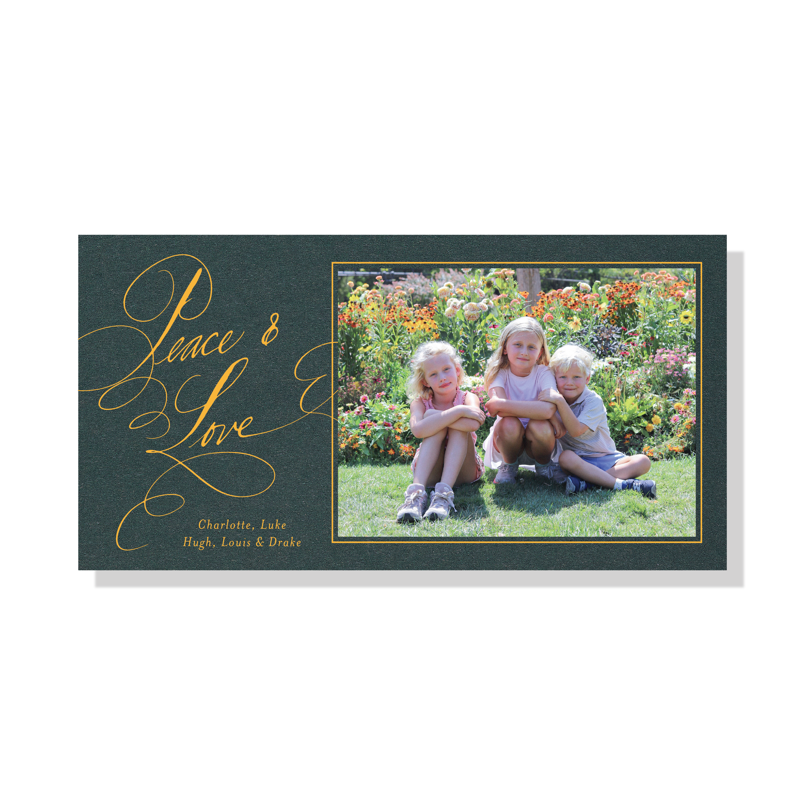 Personalized Hastings Engraved Holiday Card featuring a family photograph and graceful pen-and-ink “Peace & Love” lettering.
