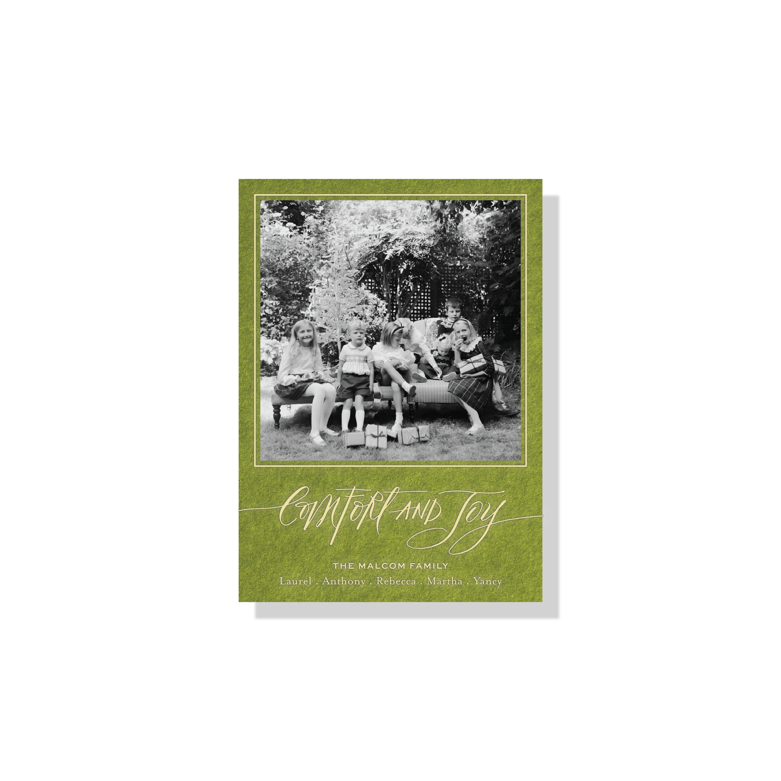 Hawthorne Engraved Photo Holiday Card featuring expressive Christmas calligraphy, a personalized family photograph, and raised engraving.