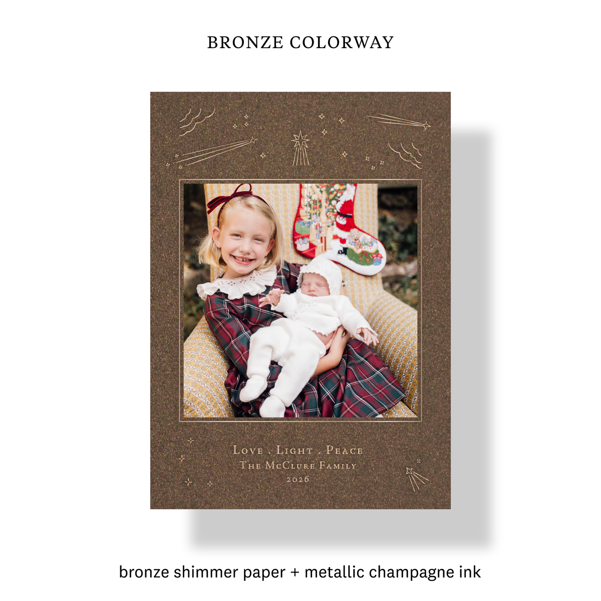 Bronze colorway of the Hera Engraved Holiday Card with mounted photo, champagne ink and shooting star details