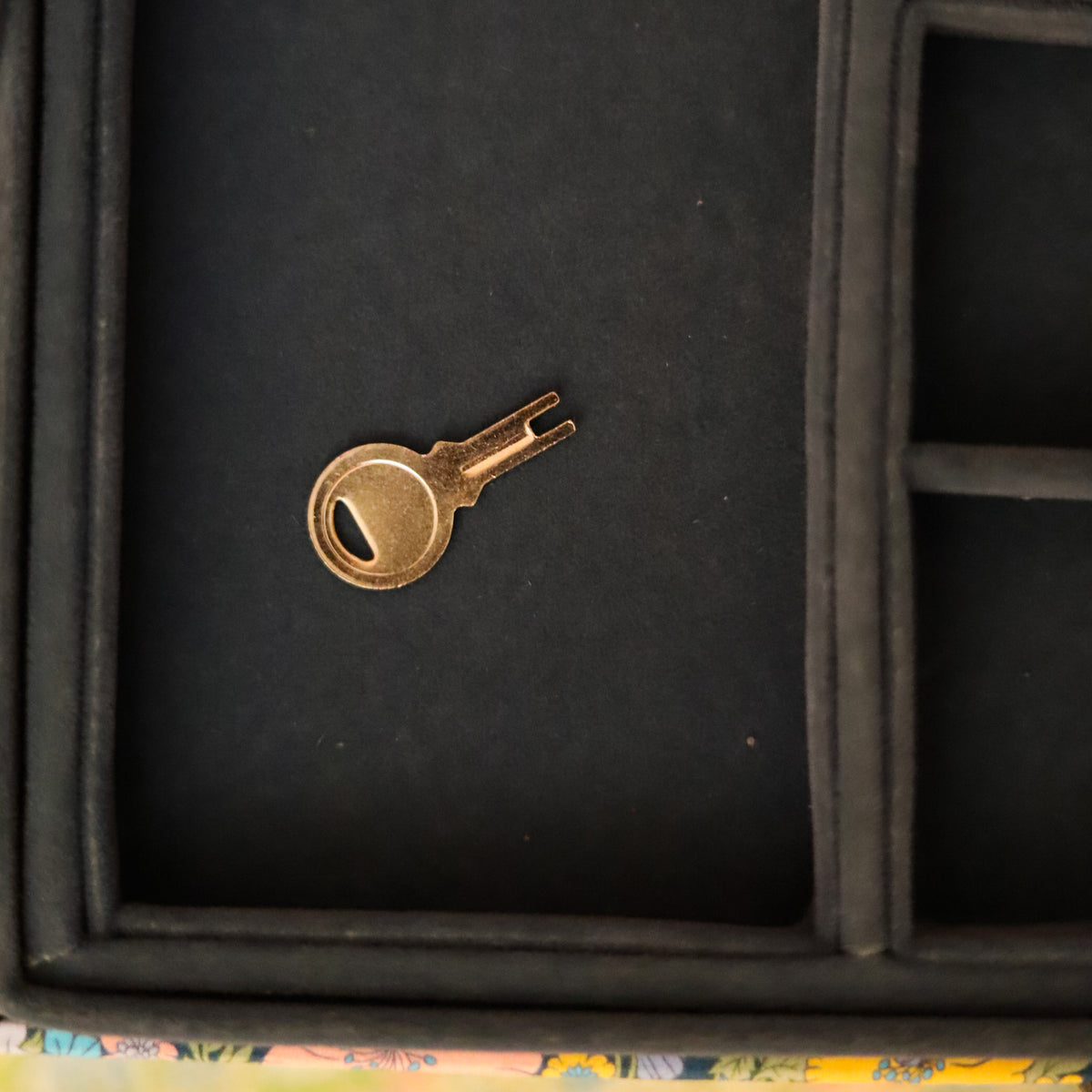 Top your dressing table with this beautiful and practical jewelry box. Fitted with a lock and key and covered in Liberty of London fabric, this jewelry box has an organizational tray that lifts out to reveal additional divided storage.&nbsp;&nbsp;