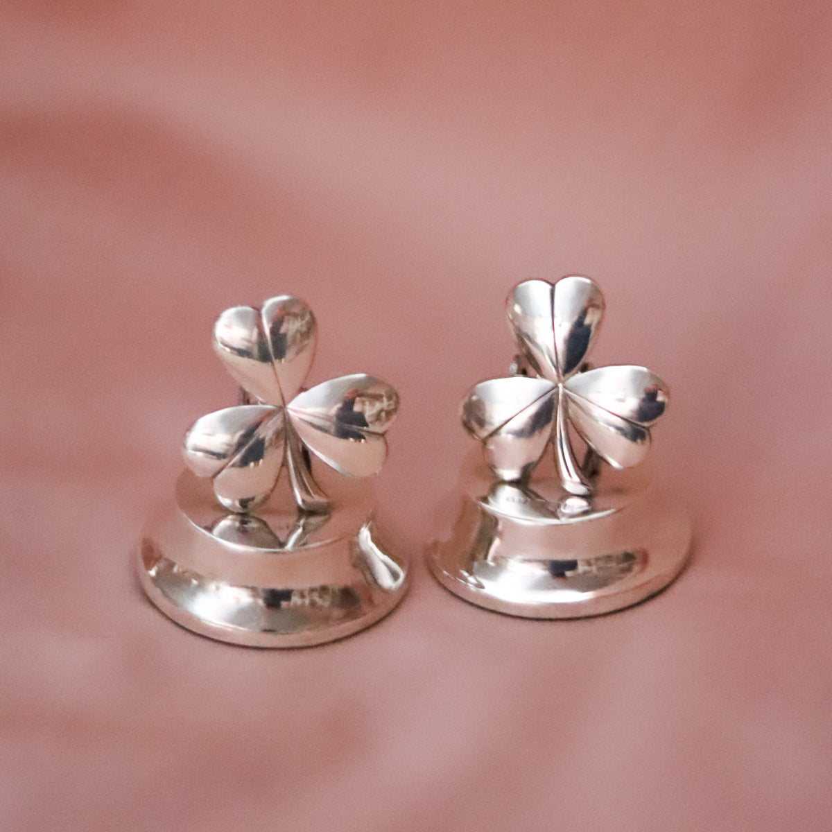 A little piece of good luck, more than a century old. This charming four-leaf clover paperweight was crafted in sterling silver and hallmarked in Birmingham, England in 1912.