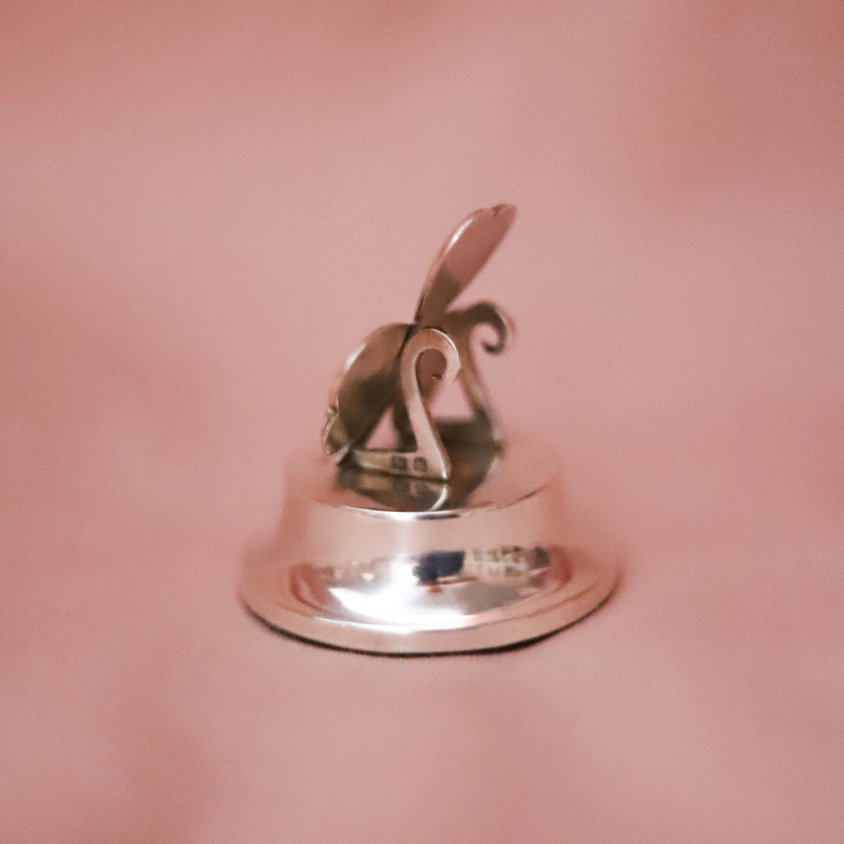 A little piece of good luck, more than a century old. This charming four-leaf clover paperweight was crafted in sterling silver and hallmarked in Birmingham, England in 1912.