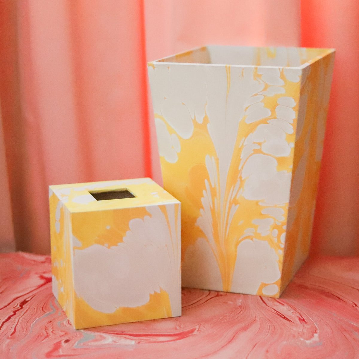 Elevate an everyday essential with our handmade marbled tissue box cover, crafted from unique papers sourced around the world. Each piece is one of a kind.