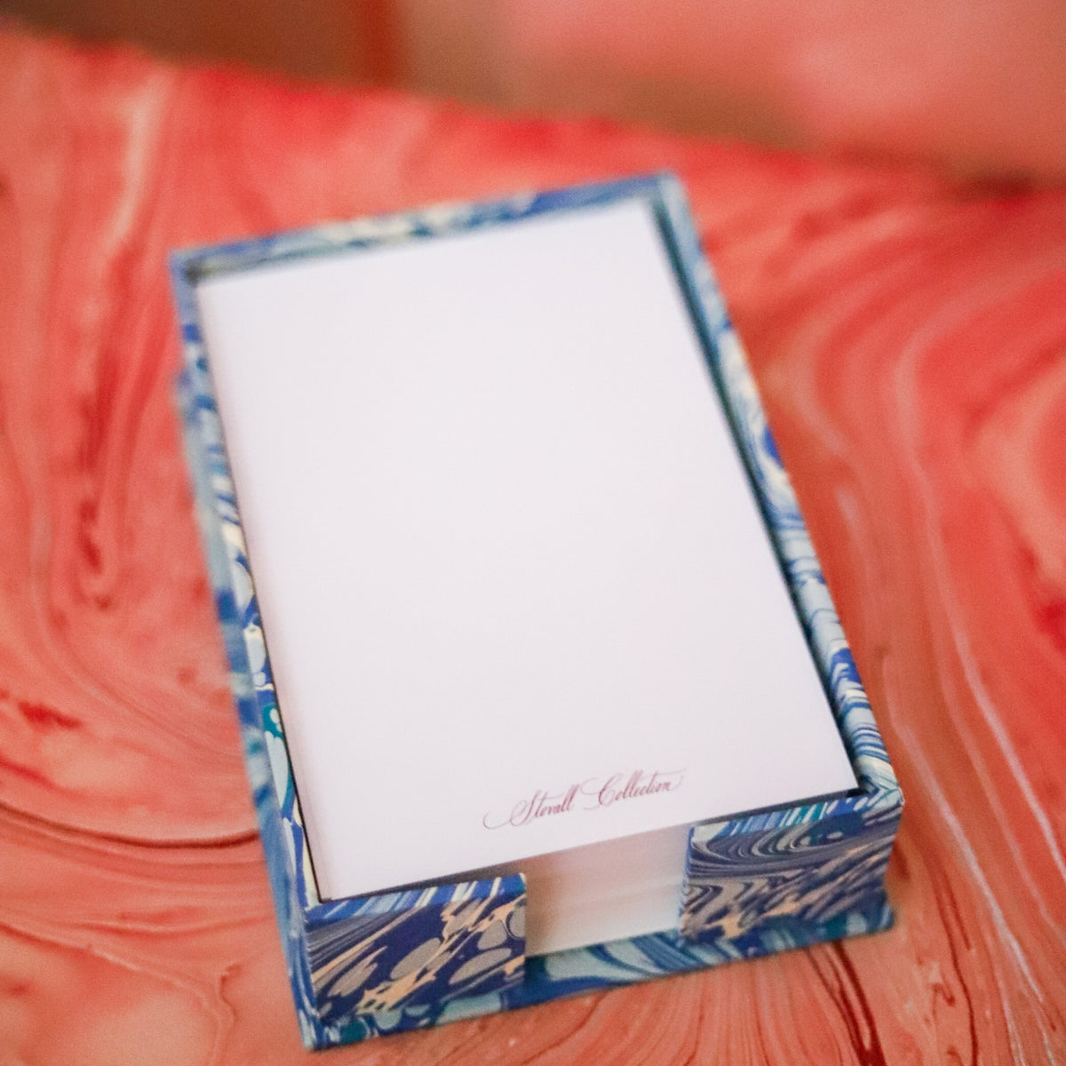 Keep notes beautifully organized with the Marbled Jotter Paper Holder, featuring a decorative marbled finish and a matching sticky note holder available separately.