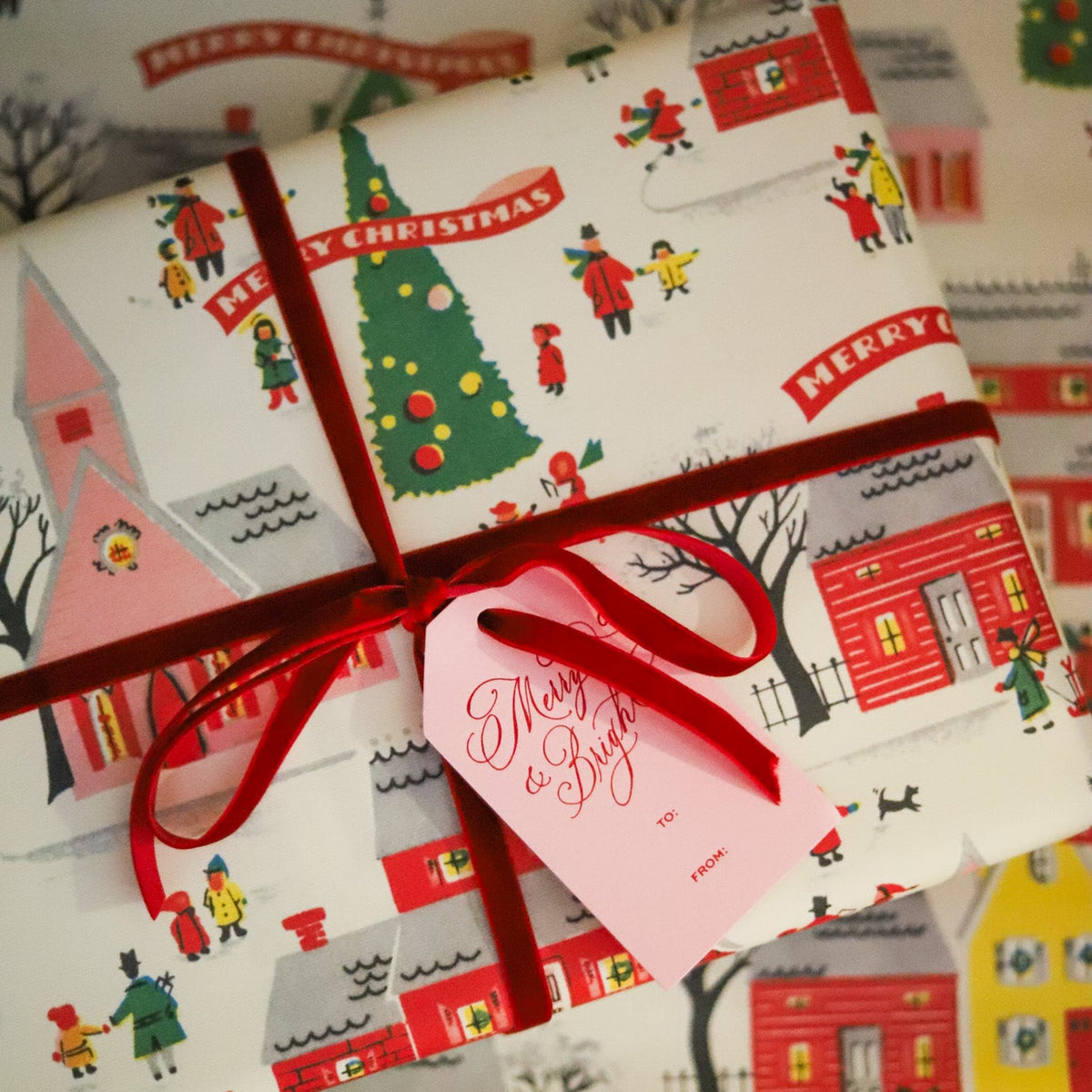 Vintage Paper with trees, a pink church, and red village buildings 