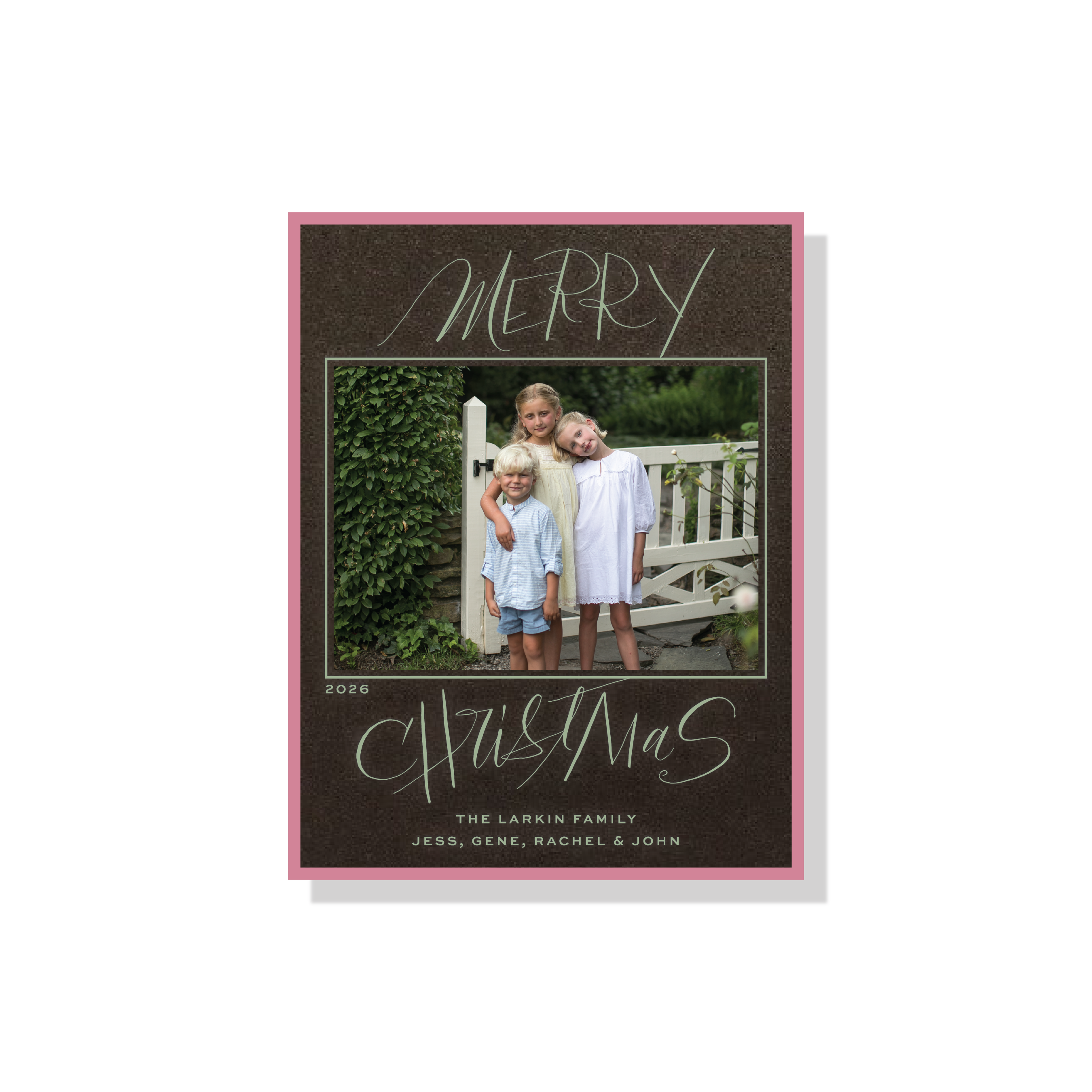 Larken Engraved Holiday Card featuring sweeping hand-lettered “Merry Christmas” calligraphy, a family photograph, and traditional engraving.