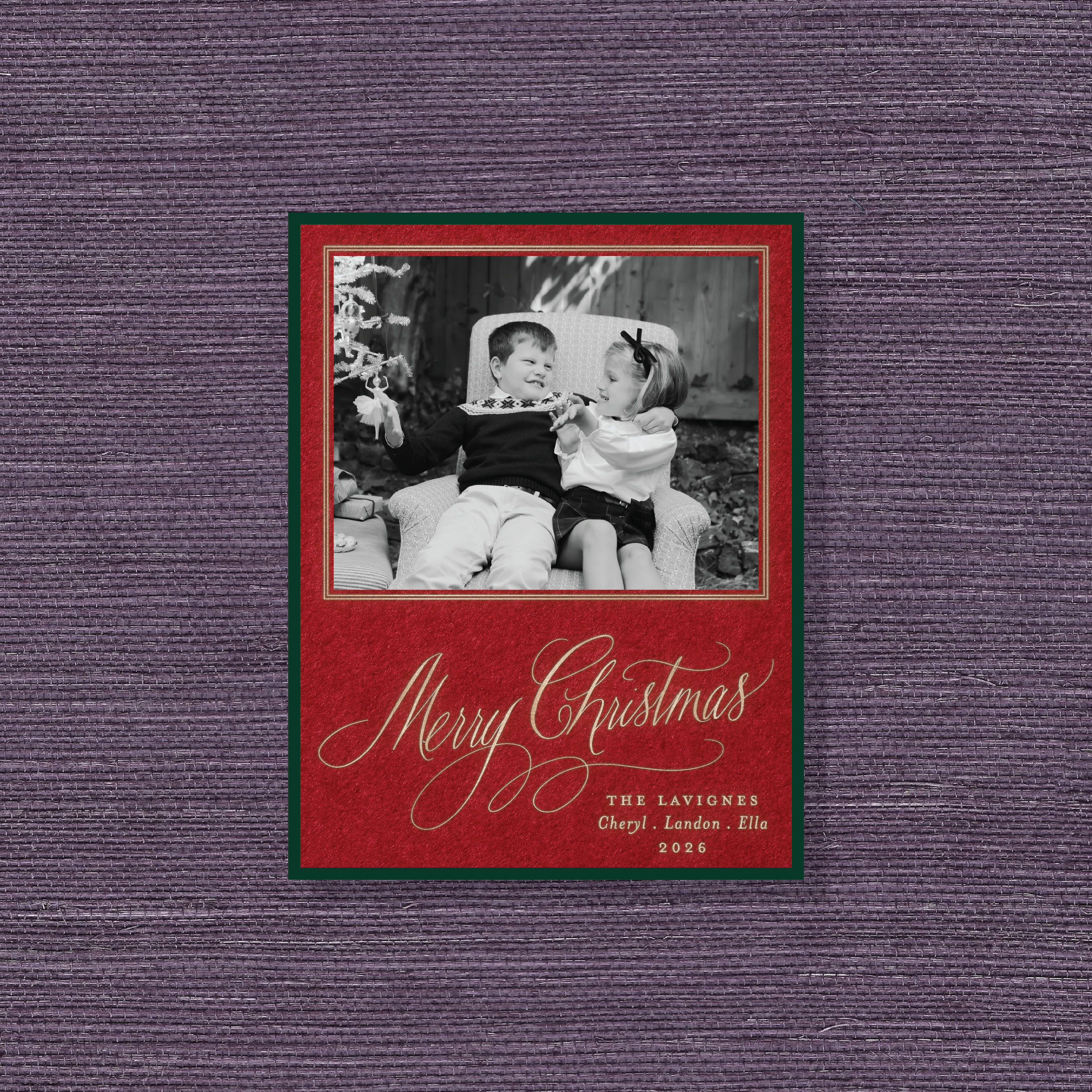 Lavigne Engraved Christmas Photo Card with a favorite family portrait, graceful “Merry Christmas” lettering, and raised engraved details.