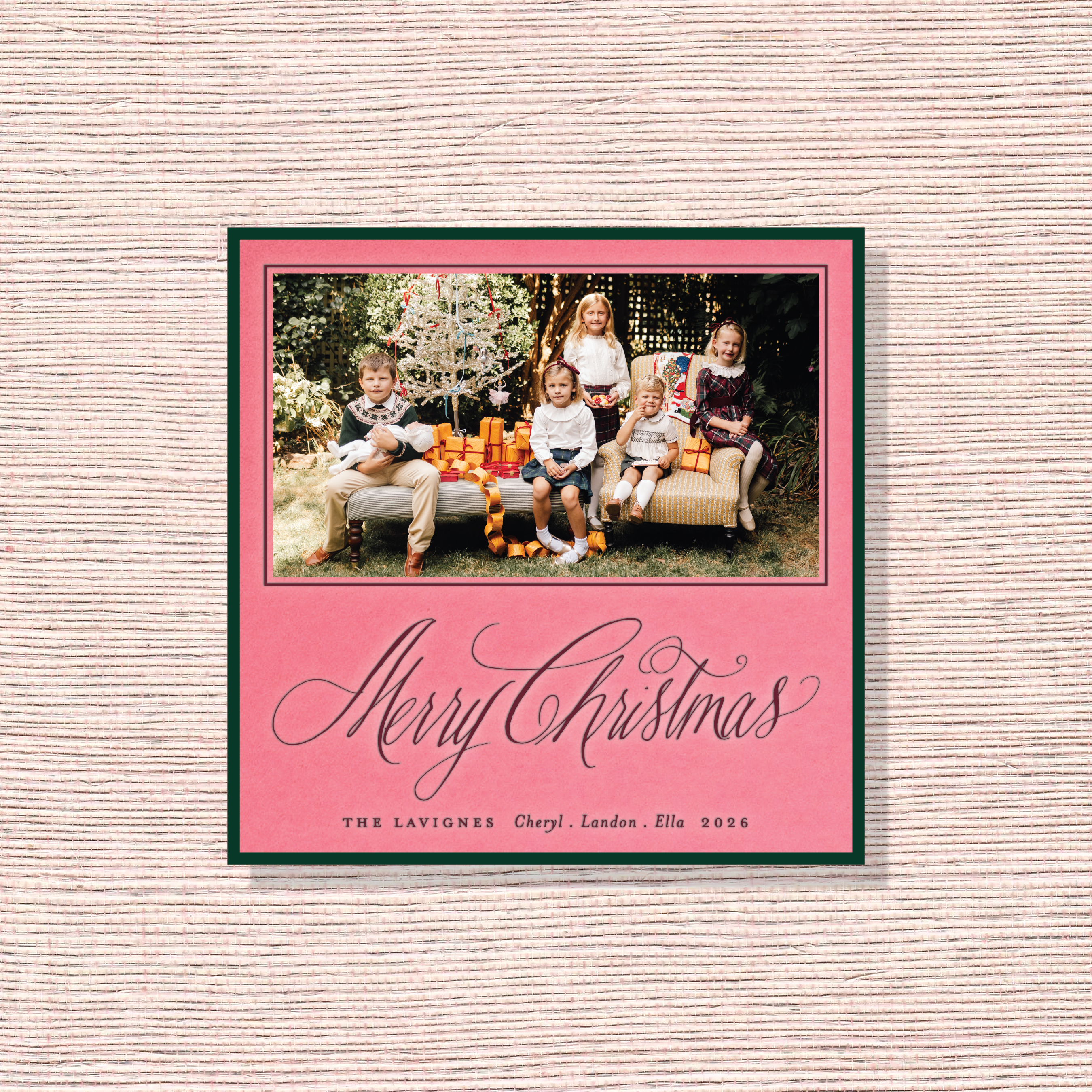 Personalized Lavigne Engraved Holiday Card featuring a family photograph and elegant pen-and-ink “Merry Christmas” artwork.