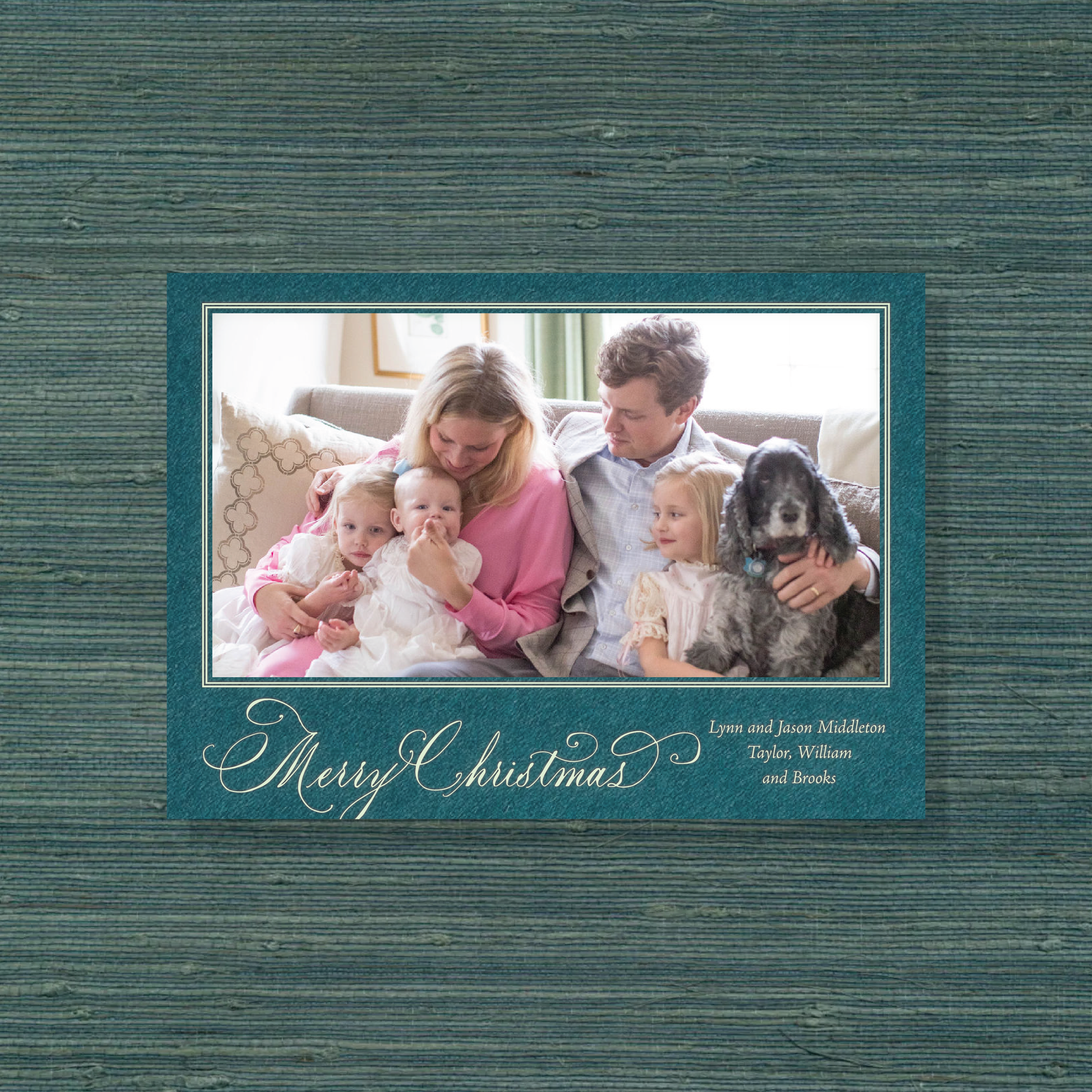 Middleton Engraved Christmas Photo Card with a family portrait, graceful “Merry Christmas” lettering, and crisp raised engraved details.