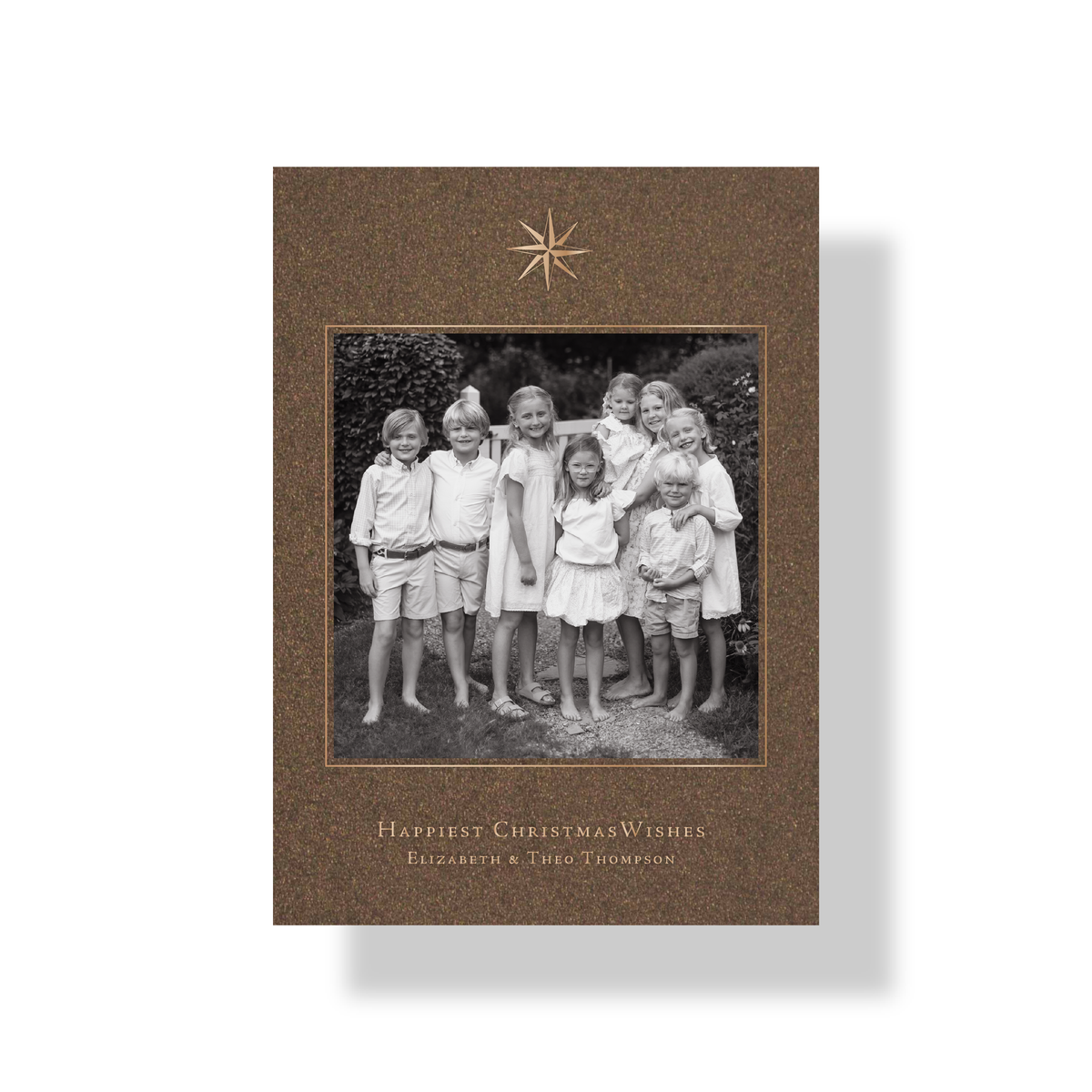 Persephone engraved photo holiday card in bronze shimmer paper with metallic champagne ink and celestial star motif