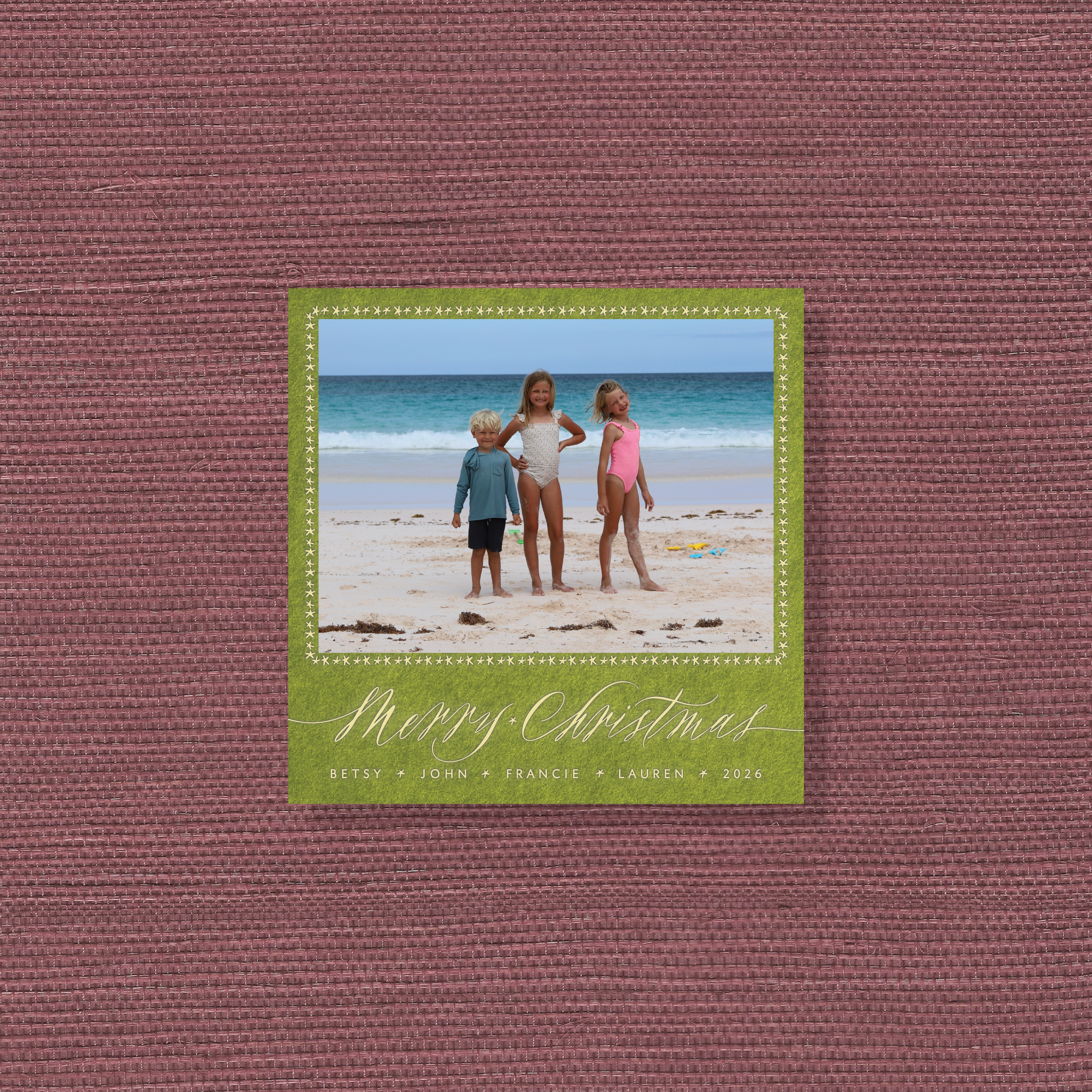 Personalized Portman Engraved Holiday Card featuring a family photograph and expressive hand-lettered “Merry Christmas” artwork.