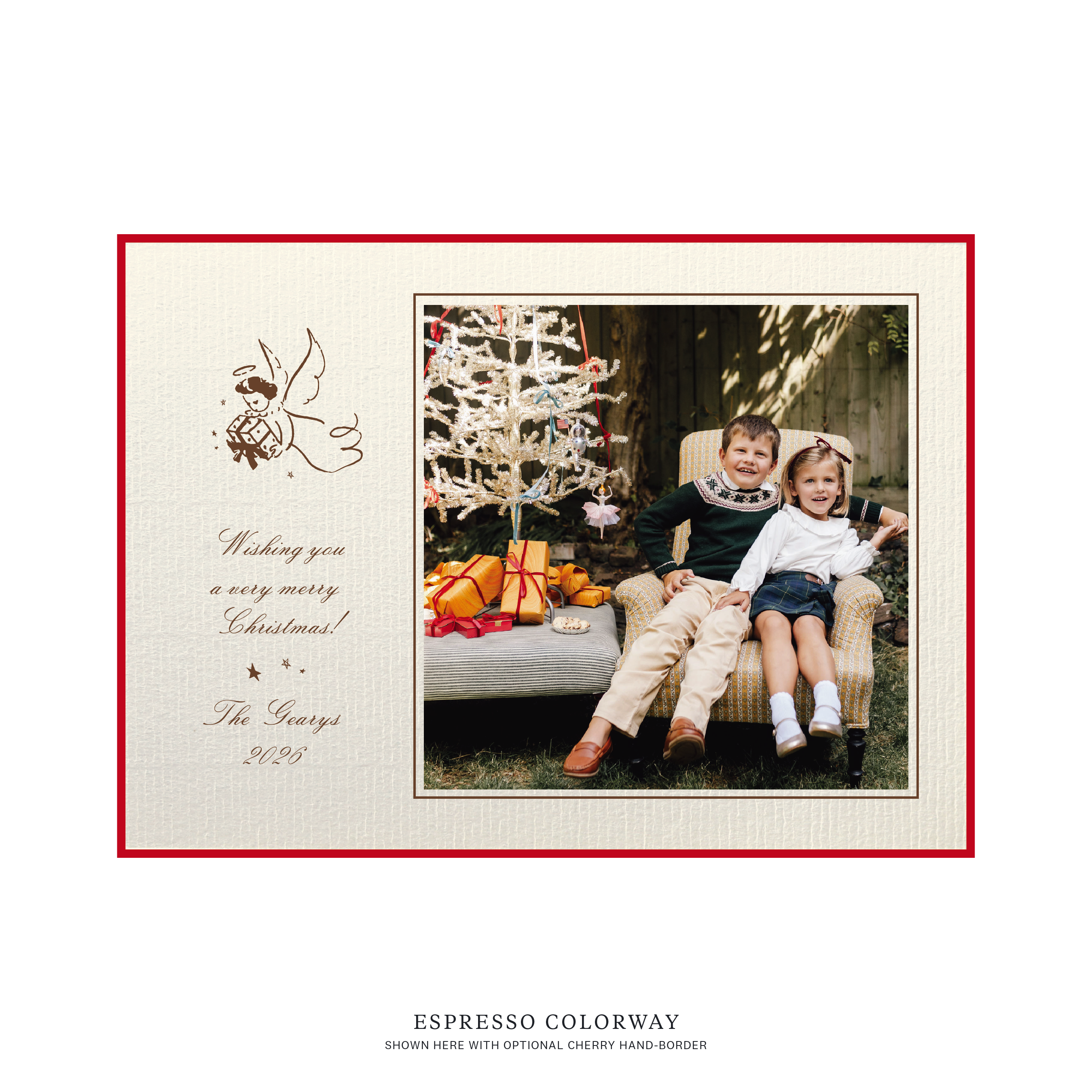 The Sutton personalized photo Christmas card by Stovall Collection, featuring a vintage Christmas angel, classic script typography and a family photograph on creamy laid paper.