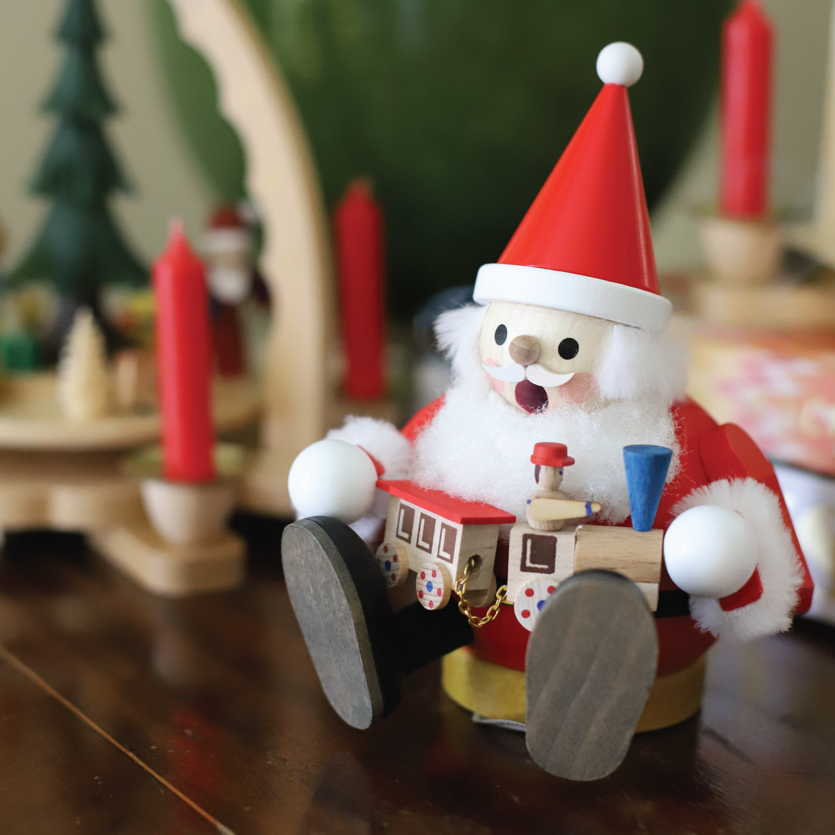 Santa’s Toy Train German wooden Christmas incense smoker featuring seated Santa holding a toy train