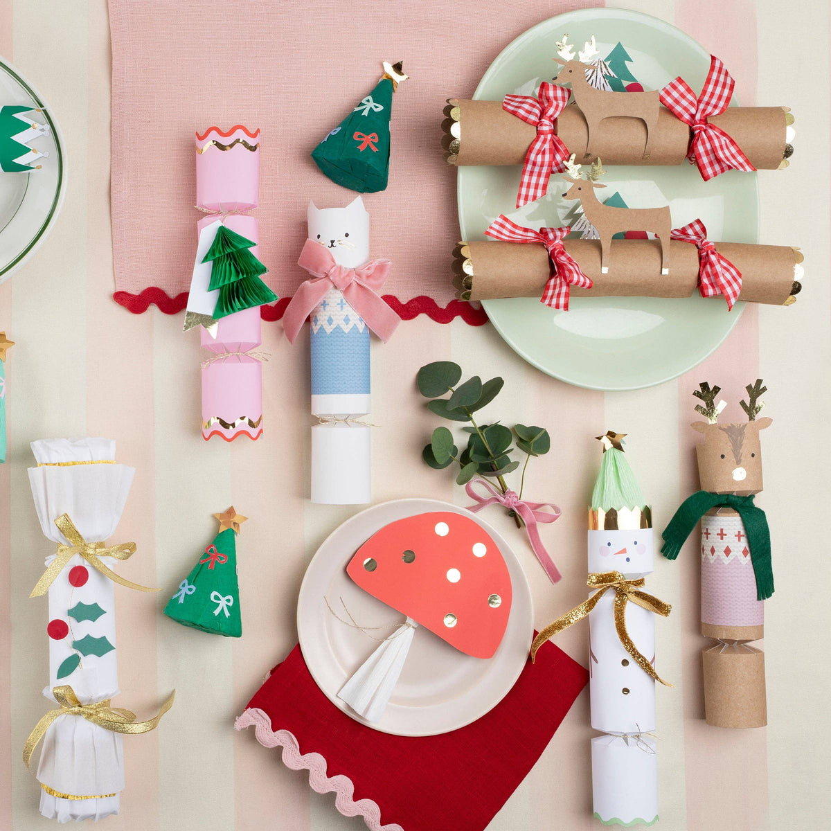 Colorful snowman Christmas crackers with gold foil details and ribbon scarves