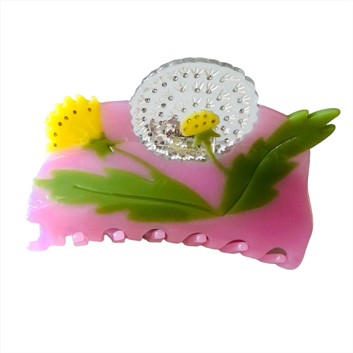 Add a playful botanical touch with the Dandelion Garden Hair Clip, crafted from colorful cellulose acetate with dimensional flowers and leafy details.